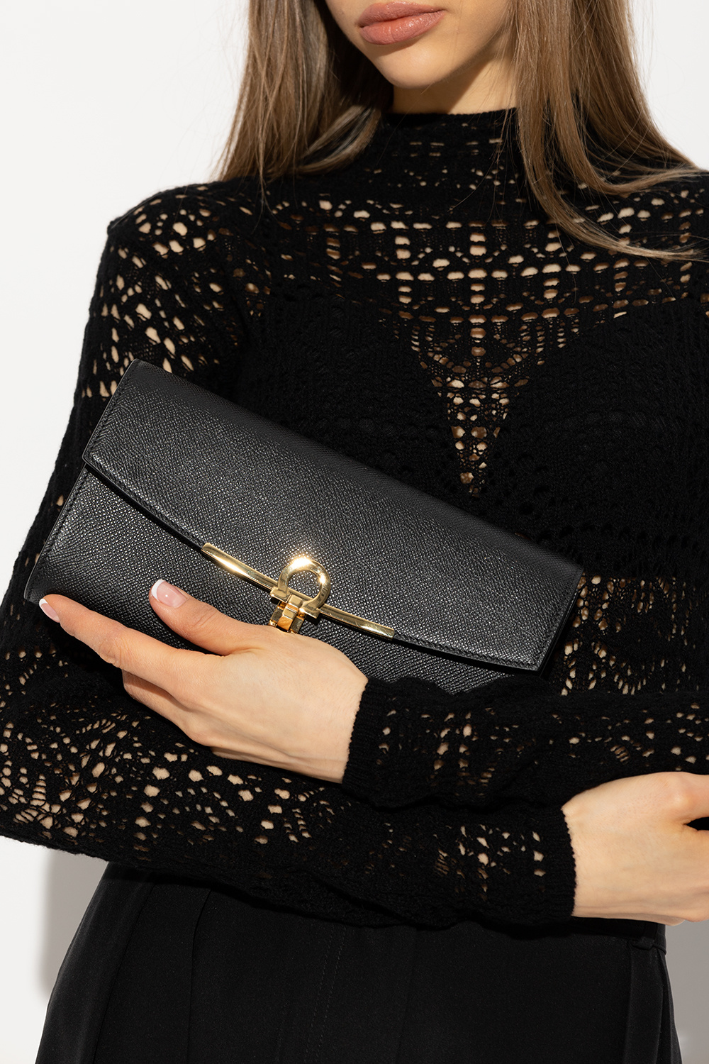 Ferragamo black clutch best sale